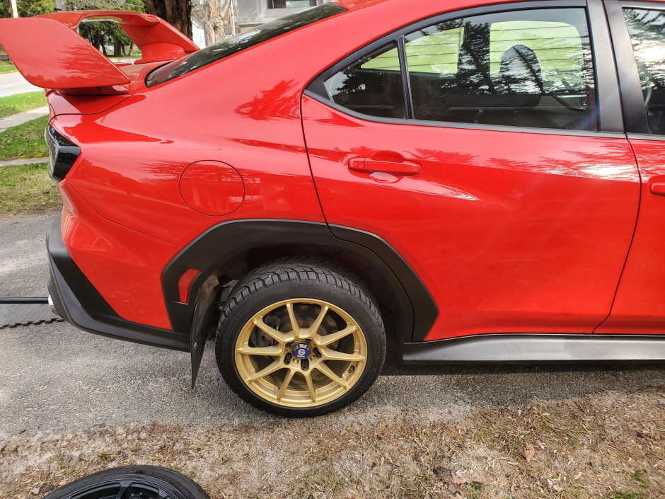 Matthew Charpentier's 2024 WRX Premium STI wing, mesh grill, badge deletes