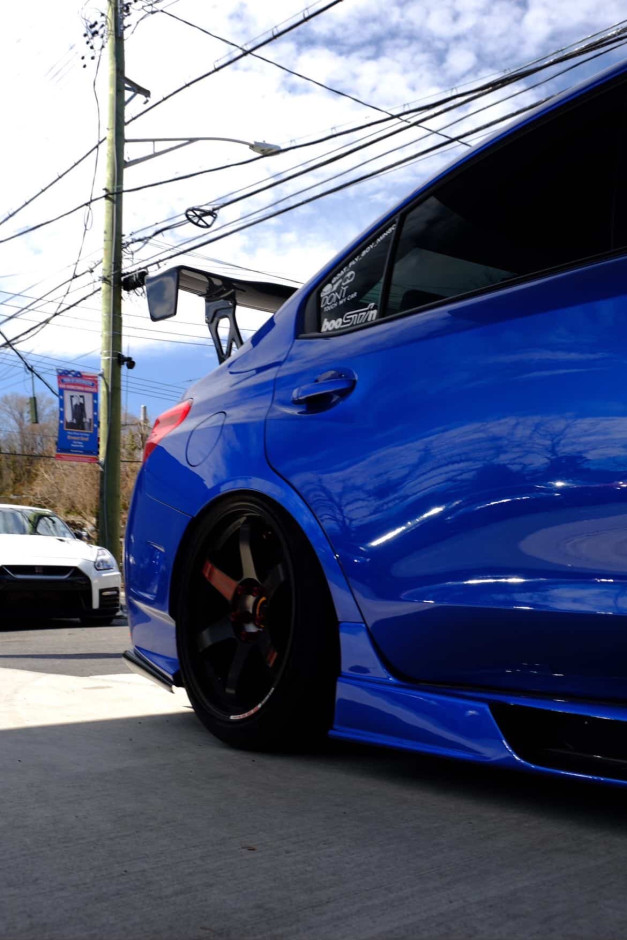 Domingo  E's 2017 WRX STI Limited Authentic Varis Rear Bumper, SideSkirts, Front Fenders, wing, and rear diffuser.