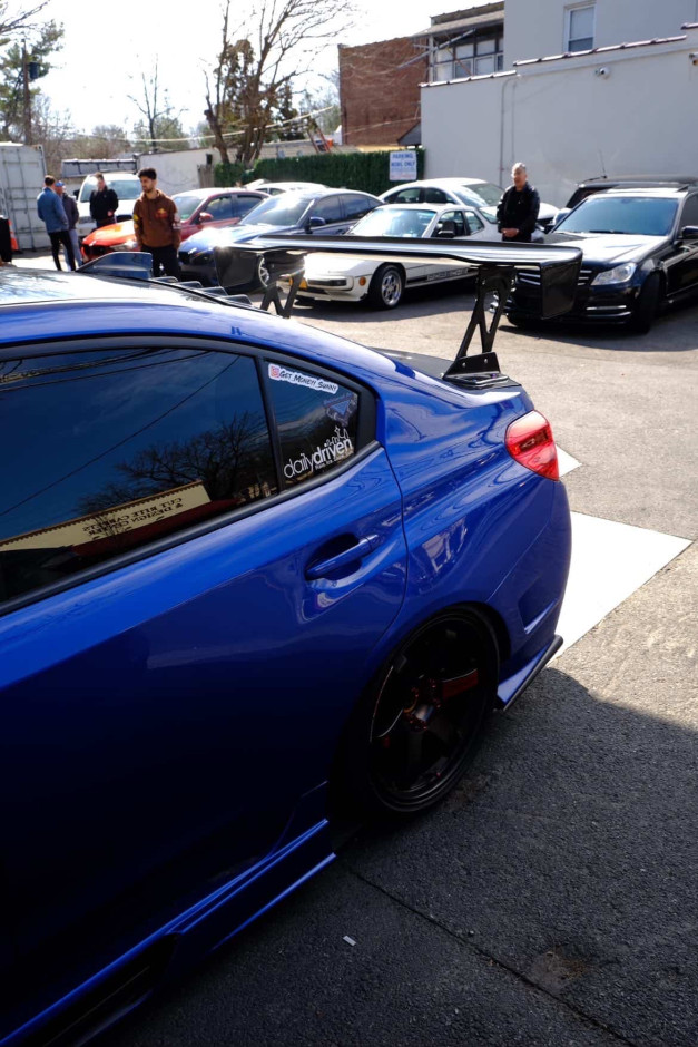 Domingo  E's 2017 WRX STI Limited Authentic Varis Rear Bumper, SideSkirts, Front Fenders, wing, and rear diffuser.