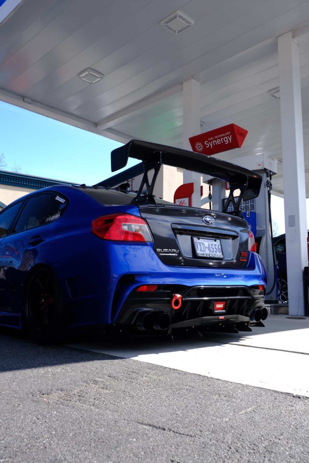 Domingo  E's 2017 WRX STI Limited Authentic Varis Rear Bumper, SideSkirts, Front Fenders, wing, and rear diffuser.