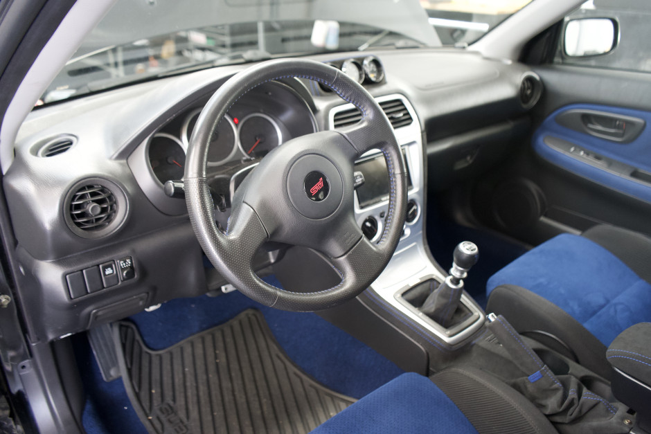 mike  C's 2007 Impreza 2.5i Special Edition fully converted to sti including sedan quarters