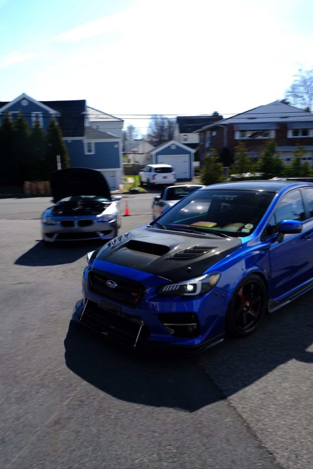 Domingo  E's 2017 WRX STI Limited Authentic Varis Rear Bumper, SideSkirts, Front Fenders, wing, and rear diffuser.