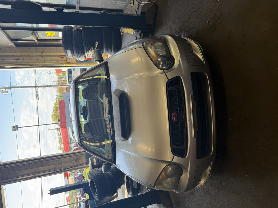 James P's 2005 Impreza WRX WR-Limited 2005 D spec girl cosmis wheels EJ208 engine