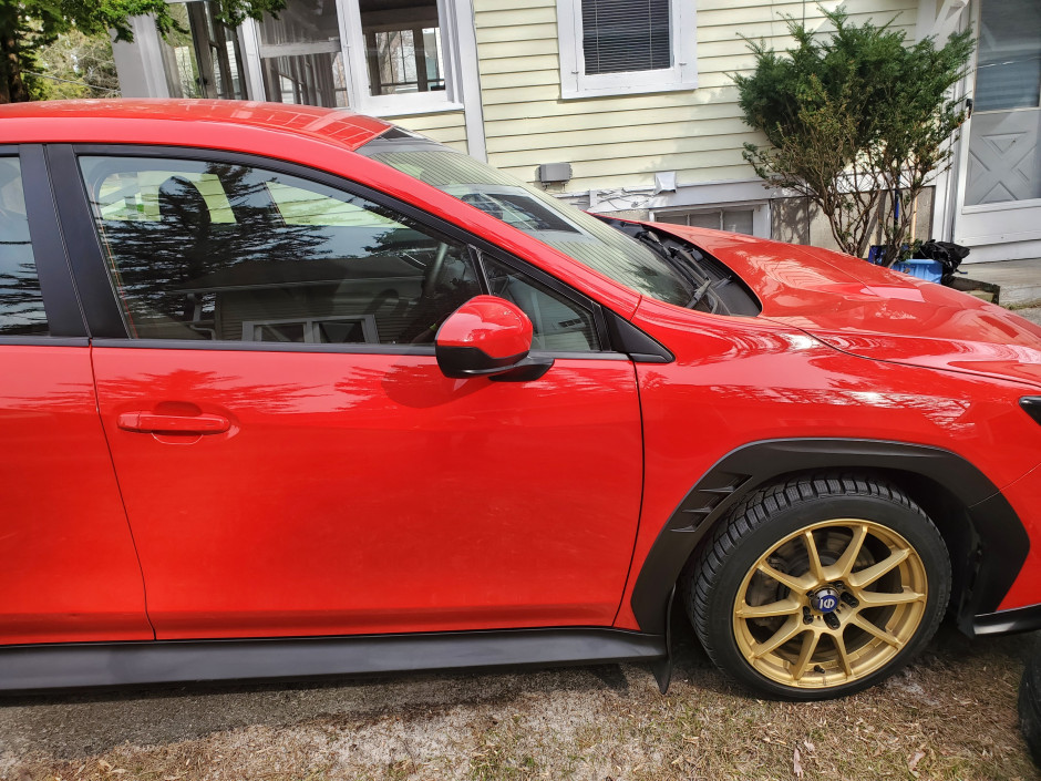 Matthew Charpentier's 2024 WRX Premium STI wing, mesh grill, badge deletes